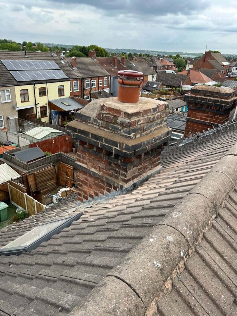 This is a photo taken from a roof which is being repaired by Mansfield Woodhouse Roofing Repairs, it shows a street of houses, and their roofs